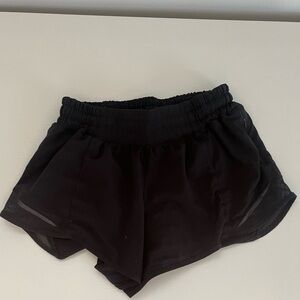 Lululemon: Black Hotty Hots 
Size 4 Length 2.5